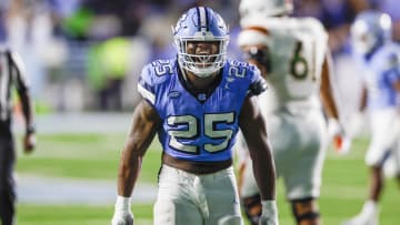 Oct 14, 2023; Chapel Hill, North Carolina, USA; North Carolina Tar Heels linebacker Kaimon Rucker (25) celebrates after sacking the Miami Hurricanes quarterback in the second half at Kenan Memorial Stadium. Mandatory Credit: Nell Redmond-USA TODAY Sports