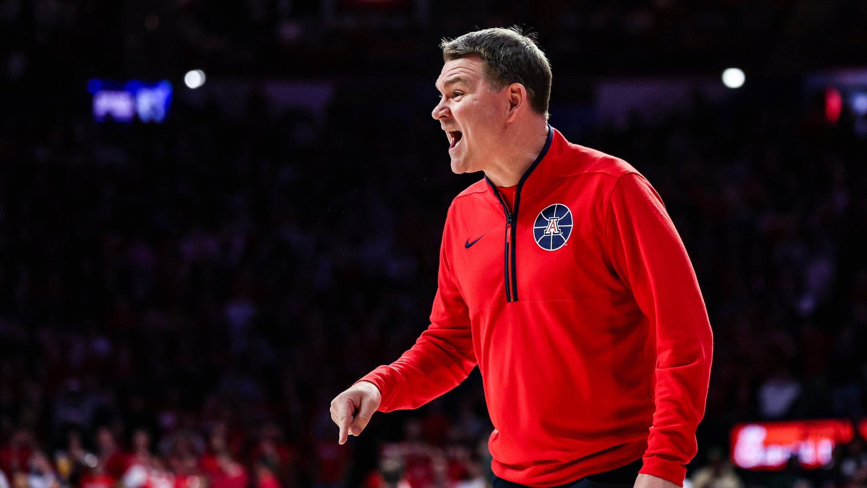 Jan 14, 2025; Tucson, Arizona, USA; Arizona Wildcats head coach Tommy Lloyd yells toward players during the first half of the game against the Baylor Bears at McKale Center. | USA TODAY Sports via Reuters Connect