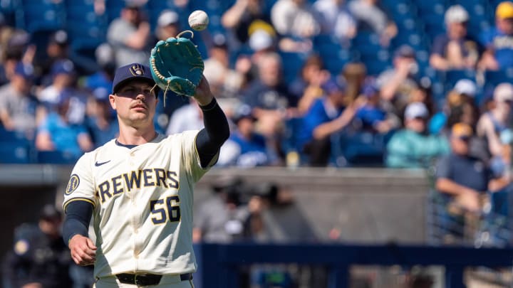 Mar 2, 2024; Phoenix, Arizona, USA; Milwaukee Brewers starting pitcher Janson Junk (56) throws around between batter in the second during a spring training game against the Los Angeles Dodgers at American Family Fields of Phoenix. Mandatory Credit: Allan Henry-USA TODAY Sports