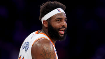 Apr 11, 2025; New York, New York, USA; New York Knicks center Mitchell Robinson (23) reacts during the first quarter against the Cleveland Cavaliers at Madison Square Garden. Mandatory Credit: Brad Penner-Imagn Images