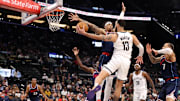 Jan 15, 2025; Inglewood, California, USA;  Brooklyn Nets guard Tyrese Martin (13) passes around LA Clippers guard Jordan Miller (11) during the fourth quarter at Intuit Dome. Mandatory Credit: Kiyoshi Mio-Imagn Images