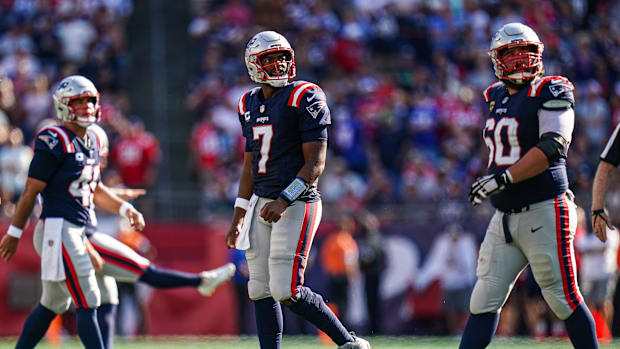 New England Patriots quarterback Jacoby Brissett (7) exits the field on fourth down against the Seattle Seahawks