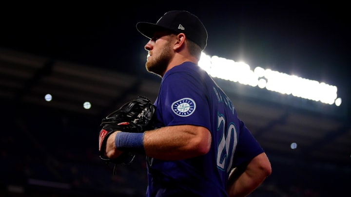 Seattle Mariners right fielder Luke Raley (20) heads to the dugout following the top of the ninth inning against the Los Angeles Angels at Angel Stadium on July 11.