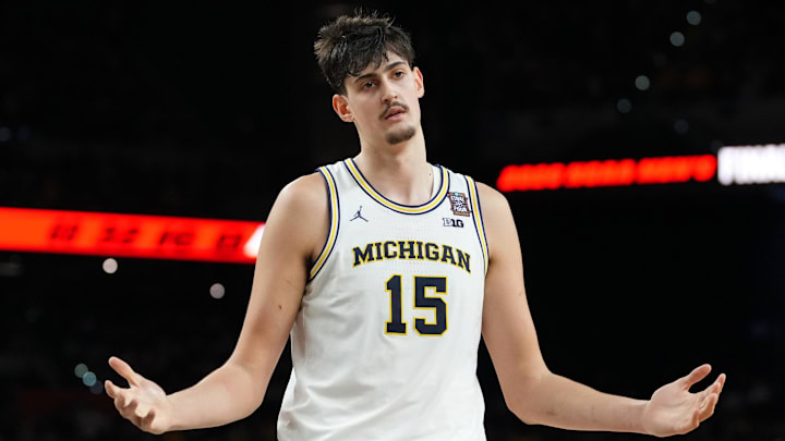 Apr 6, 2026; Indianapolis, IN, USA; Michigan Wolverines center Aday Mara (15) reacts after a play against the UConn Huskies during the first half in the national championship of the Final Four of the men's 2026 NCAA Tournament between the  and the Michigan Wolverines at Lucas Oil Stadium. Mandatory Credit: Bob Donnan-Imagn Images