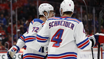 Oct 29, 2024; Washington, District of Columbia, USA; New York Rangers center Filip Chytil (72) celebrates with teammates after scoring a goal against the Washington Capitals in the second period at Capital One Arena. Mandatory Credit: Geoff Burke-Imagn Images