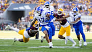 Nov 23, 2024; Tempe, Arizona, USA; Brigham Young Cougars wide receiver Keelan Marion (17) against the Arizona State Sun Devils at Mountain America Stadium. Mandatory Credit: Mark J. Rebilas-Imagn Images