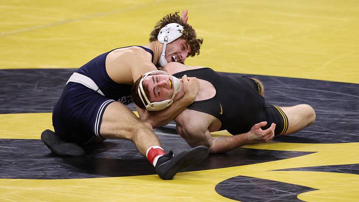 Penn State Nittany Lions Mitchell Mesenbrink (165) wrestles Iowa Hawkeyes Mikey Caliendo (165)
