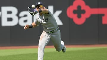 Apr 23, 2025; Cleveland, Ohio, USA; New York Yankees left fielder Jasson Dominguez (24) catches a ball hit by Cleveland Guardians left fielder Steven Kwan (not pictured) during the second inning at Progressive Field. Mandatory Credit: Ken Blaze-Imagn Images