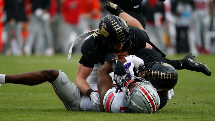 Purdue Boilermakers defensive back Dillon Thieneman makes a tackle