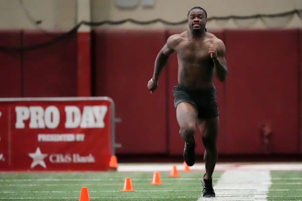 Quarterback Jalen Milroe runs the 40 yard dash at the University of Alabama Pro Day.