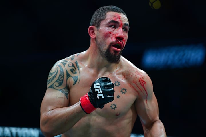 Robert Whittaker fights against Paulo Costa during UFC 298 at Honda Center. 