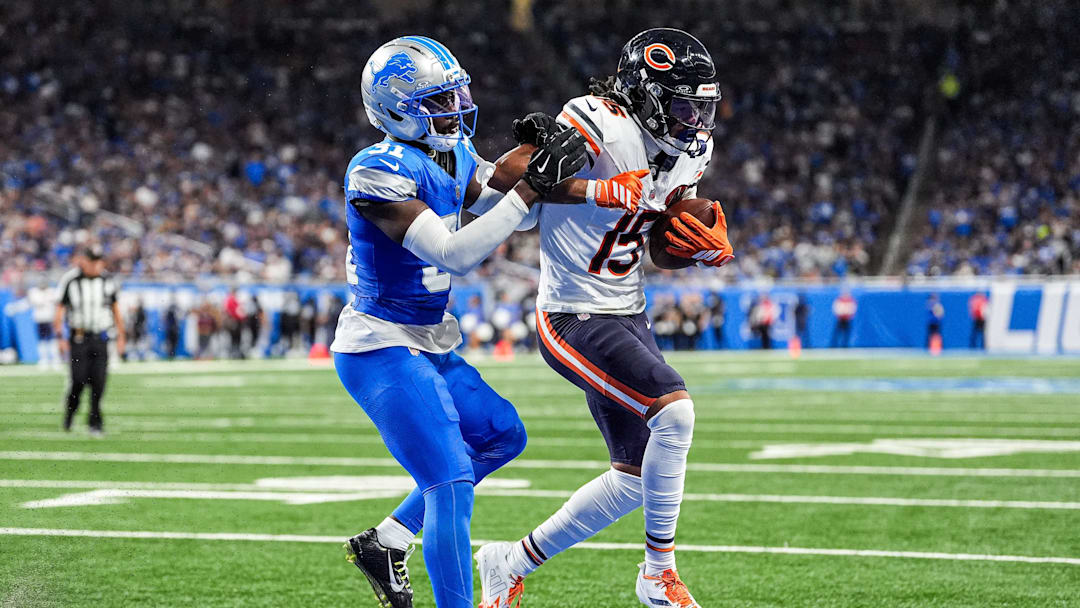 Chicago Bears wide receiver Rome Odunze (15) makes a catch for a touchdown against Detroit Lions safety Kerby Joseph (31) during the first half at Ford Field in Detroit on Sunday, Sept. 14, 2025.