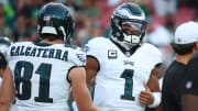 Philadelphia Eagles quarterback Jalen Hurts (1) and tight end Grant Calcaterra (81) prior to the game against the Tampa Bay Buccaneers at Raymond James Stadium. 