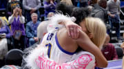 Nov 30, 2023; Baton Rouge, Louisiana, USA; LSU Lady Tigers forward Angel Reese (10) embraces LSU