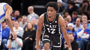 Dec 21, 2024; Memphis, Tennessee, USA; Mississippi State Bulldogs guard Josh Hubbard (12) dribbles the ball against the Memphis Tigers during the second half at FedExForum. Mandatory Credit: Wesley Hale-Imagn Images