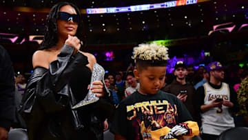 Dec 5, 2023; Los Angeles, California, USA; Media personality and socialite Kim Kardashian with Saint West i attendance at the In Season Tournament quarterfinal between the Los Angeles Lakers and Phoenix Suns at Crypto.com Arena. Mandatory Credit: Gary A. Vasquez-Imagn Images