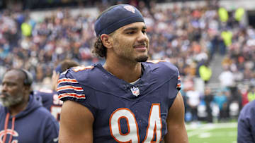 Oct 13, 2024; London, United Kingdom; Chicago Bears defensive end Austin Booker (94) leaves the field after an NFL International Series game at Tottenham Hotspur Stadium. Mandatory Credit: Peter van den Berg-Imagn Images