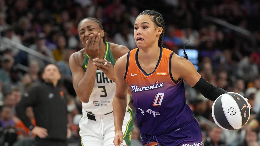 Jun 7, 2025; Phoenix, Arizona, USA; Phoenix Mercury forward Satou Sabally (0) gets called for an offensive foul on Seattle Storm guard Skylar Diggins (4) in the second half at Footprint Center. Mandatory Credit: Rick Scuteri-Imagn Images