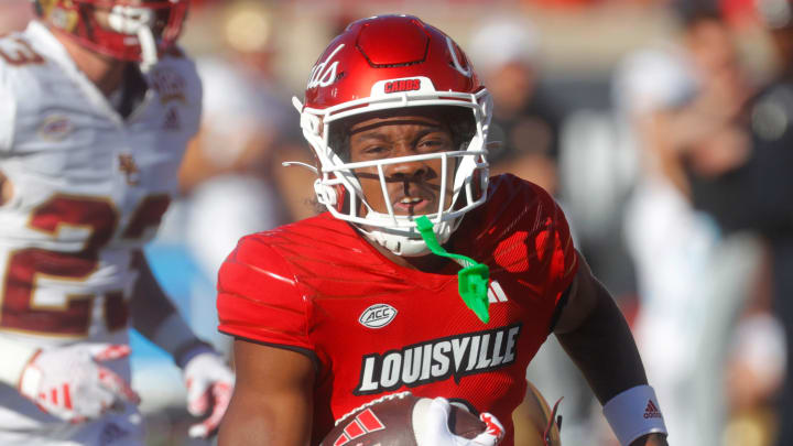 Louisville's Ahmari Huggins-Bruce catches a ball for a touchdown against Boston College Saturday afternoon in L&N Stadium.