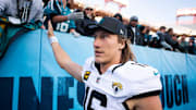 Nov 30, 2025; Nashville, Tennessee, USA;  Jacksonville Jaguars quarterback Trevor Lawrence (16) high fives the fans against the Tennessee Titans during the second half at Nissan Stadium. Mandatory Credit: Steve Roberts-Imagn Images