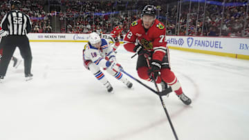 Jan 5, 2025; Chicago, Illinois, USA; New York Rangers left wing Artemi Panarin (10) defends Chicago Blackhawks defenseman Alex Vlasic (72) during the third period at United Center. Mandatory Credit: David Banks-Imagn Images