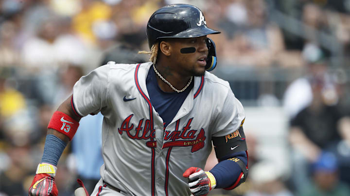May 26, 2024; Pittsburgh, Pennsylvania, USA;  Atlanta Braves right fielder Ronald Acuña Jr. (13) runs to second base with a double against the Pittsburgh Pirates during the first inning at PNC Park. Mandatory Credit: Charles LeClaire-USA TODAY Sports