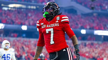 Texas Tech Red Raiders tight end Terrance Carter Jr. (7) reacts after scoring a two-point conversion during the second half against the BYU Cougars at AT&T Stadium.
