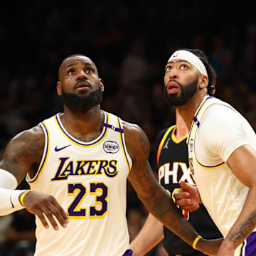 Nov 26, 2024; Phoenix, Arizona, USA; Los Angeles Lakers forward LeBron James (23) and forward Anthony Davis (3) against the Phoenix Suns during an NBA Cup game at Footprint Center. Mandatory Credit: Mark J. Rebilas-Imagn Images