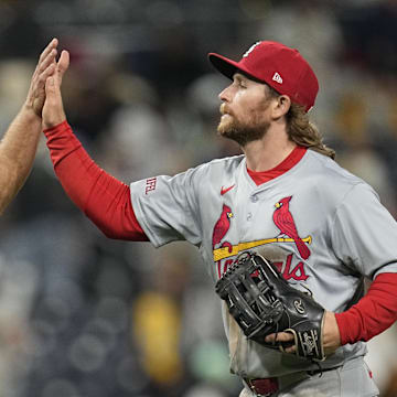 Apr 2, 2024; San Diego, California, USA; St. Louis Cardinals first baseman Paul Goldschmidt (left) and left field Brendan Donovan (33) celebrate after defeating the San Diego Padres at Petco Park. Mandatory Credit: Ray Acevedo-Imagn Images