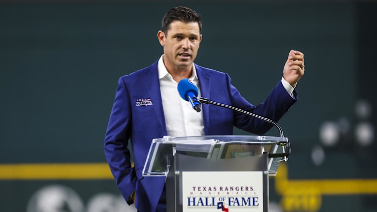 Texas Rangers former player Ian Kinsler gives a speech after being inducted into the Rangers Hall of Fame.