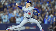 Los Angeles Dodgers pitcher Yoshinobu Yamamoto pitches against the Toronto Blue Jays in the first inning during Game 6 of the 2025 World Series at Rogers Centre.
