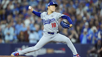 Los Angeles Dodgers pitcher Yoshinobu Yamamoto pitches against the Toronto Blue Jays in the first inning during Game 6 of the 2025 World Series at Rogers Centre.
