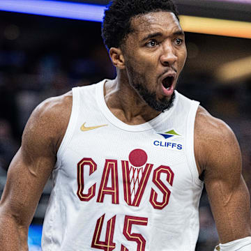 Jan 14, 2025; Indianapolis, Indiana, USA;  Cleveland Cavaliers guard Donovan Mitchell (45) reacts to a made shot and foul  the first half against the Indiana Pacers at Gainbridge Fieldhouse. Mandatory Credit: Trevor Ruszkowski-Imagn Images