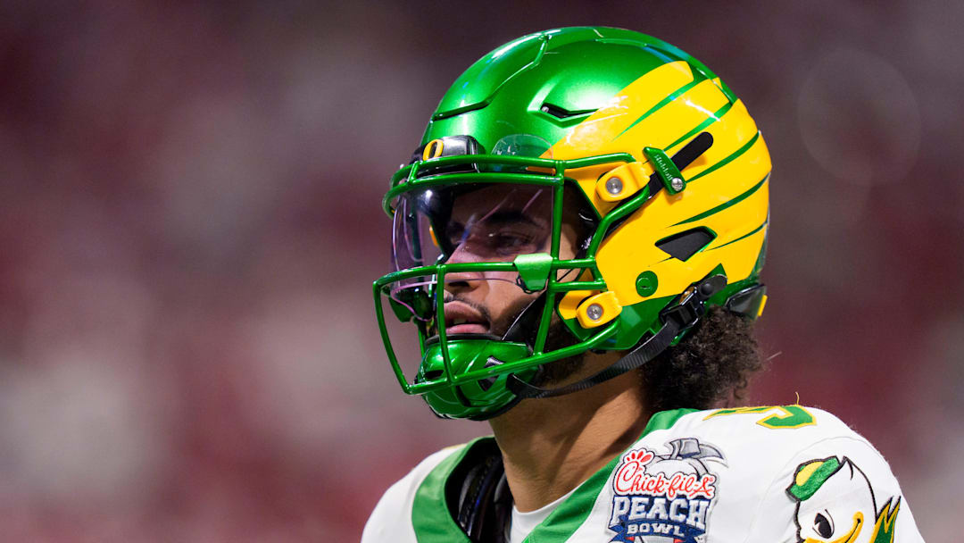 Oregon quarterback Dante Moore warms up as the Oregon Ducks face the Indiana Hoosiers in the Peach Bowl on Jan. 9, 2026, at Mercedes-Benz Stadium in Atlanta, Georgia.