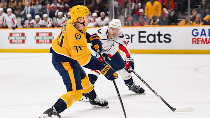 Jan 11, 2026; Nashville, Tennessee, USA;  Nashville Predators right wing Matthew Wood (71) takes a shot on goal against the Washington Capitals during the third period at Bridgestone Arena. Mandatory Credit: Steve Roberts-Imagn Images