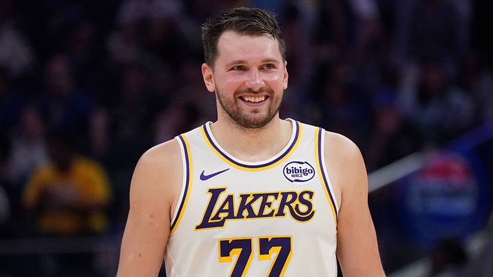 Feb 28, 2026; San Francisco, California, USA;  Los Angeles Lakers forward/guard Luka Doncic (77) smiles during a break in the action against the Golden State Warriors in the third period at Chase Center. Mandatory Credit: David Gonzales-Imagn Images