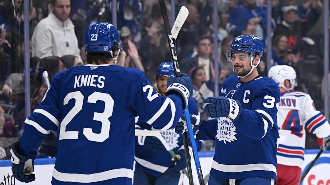Oct 16, 2025; Toronto, Ontario, CAN; Toronto Maple Leafs forward Matthew Knies (23) celebrates with forward Auston Matthews (34) after scoring a goal against the New York Rangers in the first period at Scotiabank Arena. Mandatory Credit: Dan Hamilton-Imagn Images