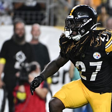 Aug 16, 2025; Pittsburgh, Pennsylvania, USA; Pittsburgh Steelers running back Trey Sermon (27) celebrates a touchdown  against the Tampa Bay Buccaneers during the second half at Acrisure Stadium. Mandatory Credit: Barry Reeger-Imagn Images
