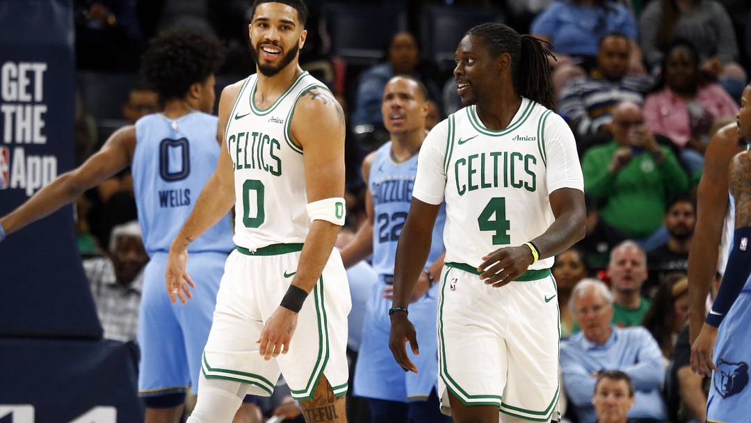 Mar 31, 2025; Memphis, Tennessee, USA; Boston Celtics forward Jayson Tatum (0) reacts with Boston Celtics guard Jrue Holiday (4) during the third quarter against the Memphis Grizzlies at FedExForum. Mandatory Credit: Petre Thomas-Imagn Images Mar 31, 2025; Memphis, Tennessee, USA; Boston Celtics forward Jayson Tatum (0) reacts with Boston Celtics guard Jrue Holiday (4) during the third quarter against the Memphis Grizzlies at FedExForum. Mandatory Credit: Petre Thomas-Imagn Images