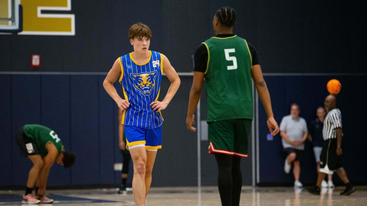 Greenfield Central's Braylon Mullins (24) walks back to defense during a scrimmage against Lawrence North at the Notre Dame Team Camp at Rolfs Athletics Hall on Thursday, June 13, 2024, in South Bend.