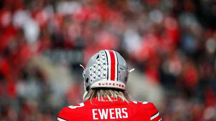 Sat., Nov. 20, 2021; Columbus, Ohio, USA; Ohio State Buckeyes quarterback Quinn Ewers (3) practices on the sideline during a break in play in the second quarter of a NCAA Division I football game between the Ohio State Buckeyes and the Michigan State Spartans at Ohio Stadium. Mandatory Credit: Joshua A. Bickel/Columbus Dispatch via USA TODAY Network.

Cfb Michigan State Spartans At Ohio State Buckeyes