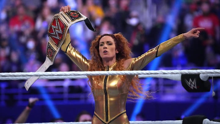 Jan 29, 2022; St. Louis, MO, USA; Becky Lynch celebrates with the WWE Smackdown Womens Championship during the Royal Rumble at The Dome at America's Center. Mandatory Credit: Joe Camporeale-Imagn Images