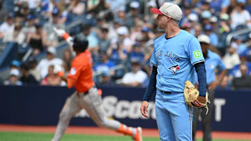 Jul 4, 2024: Toronto Blue Jays relief pitcher Trevor Richards looks on as Houston Astros shortstop Jeremy Pena (3) rounds the bases after hitting a solo home run in the seventh  inning at Rogers Centre. 