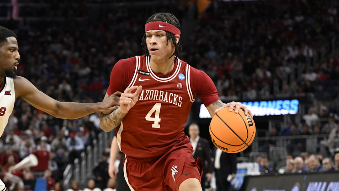 Mar 27, 2025; San Francisco, CA, USA; Arkansas Razorbacks forward Trevon Brazile (4) drives to the hoop past Texas Tech Red Raiders guard Kevin Overton (1) during the first half during a West Regional semifinal of the 2025 NCAA tournament at Chase Center. Mandatory Credit: Eakin Howard-Imagn Images