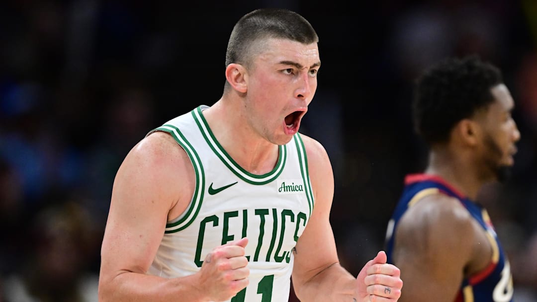 Nov 30, 2025; Cleveland, Ohio, USA; Boston Celtics guard Payton Pritchard (11) reacts after making a three point basket during the second half against the Cleveland Cavaliers at Rocket Arena. Mandatory Credit: David Dermer-Imagn Images