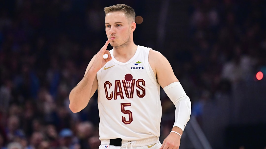 Mar 30, 2025; Cleveland, Ohio, USA; Cleveland Cavaliers guard Sam Merrill (5) celebrates after hitting a three point basket during the first half against the Los Angeles Clippers at Rocket Arena. Mandatory Credit: Ken Blaze-Imagn Images