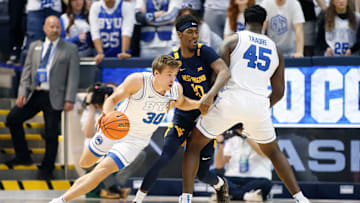 Dallin Hall attacks the screen against West Virginia.