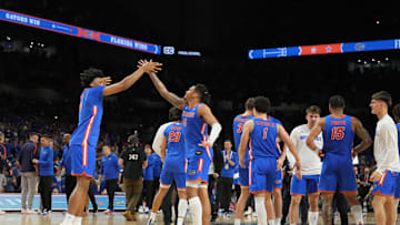 Apr 5, 2025; San Antonio, TX, USA;  Florida Gators players celebrate after defeating the Auburn Tigers in the semifinals of the men's Final Four of the 2025 NCAA Tournament at the Alamodome. Mandatory Credit: Robert Deutsch-Imagn Images