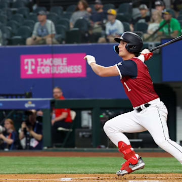 American League Future infielder Cole Young (1) singles during the first inning against the National League Future team during the Major league All-Star Futures game at Globe Life Field on July 13.