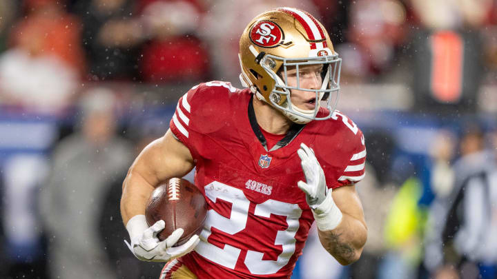 January 20, 2024; Santa Clara, CA, USA; San Francisco 49ers running back Christian McCaffrey (23) runs the ball against the Green Bay Packers during the first quarter in a 2024 NFC divisional round game at Levi's Stadium. Mandatory Credit: Kyle Terada-USA TODAY Sports